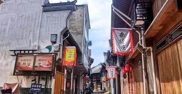 什么是摘牌_古镇摘牌后发展_河桥古镇无门票策略